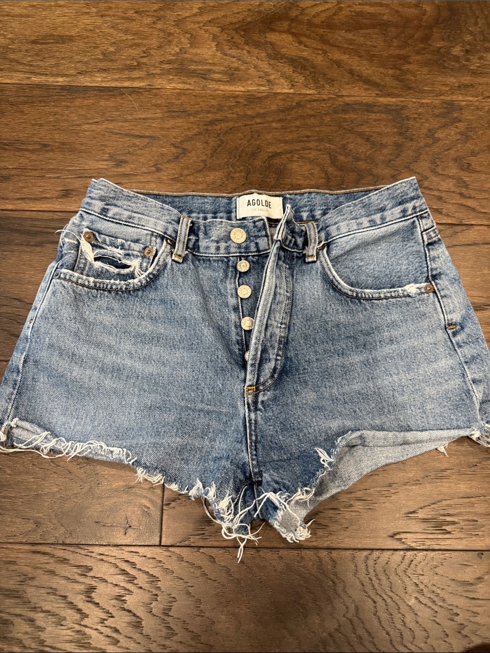 Agolde Faded Light Blue High-Waist Button-Front Denim Shorts